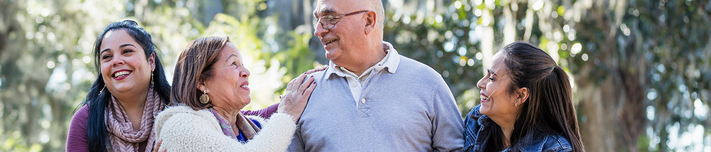 Senior couple with two daughters