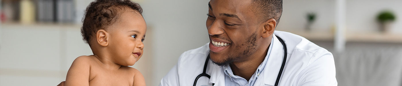 Pediatric doctor with an infant